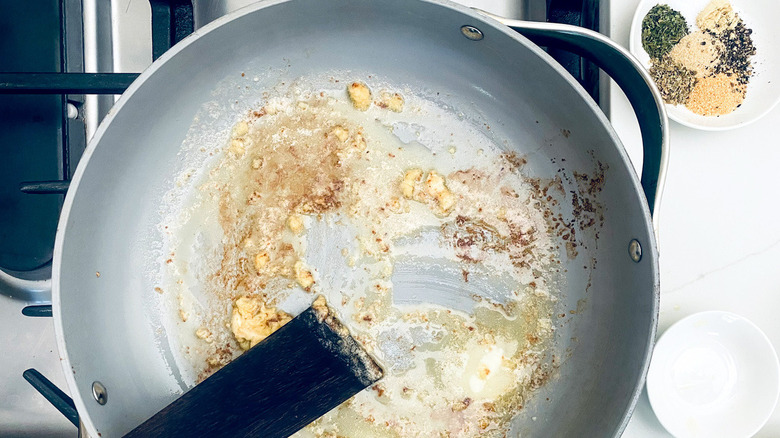 butter and garlic in pan