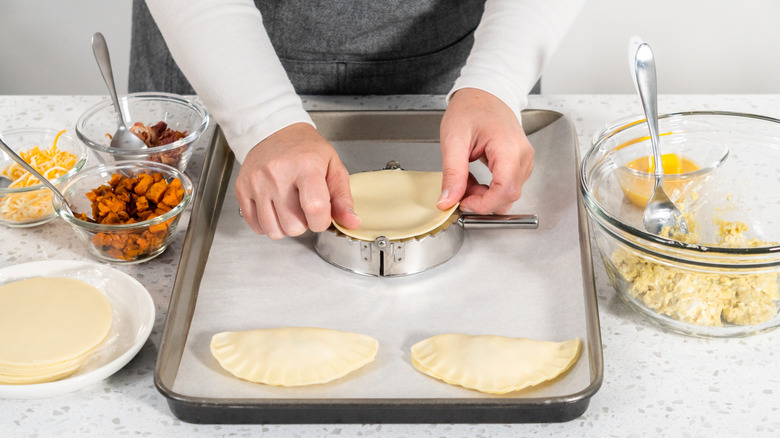 Making a breakfast empanada