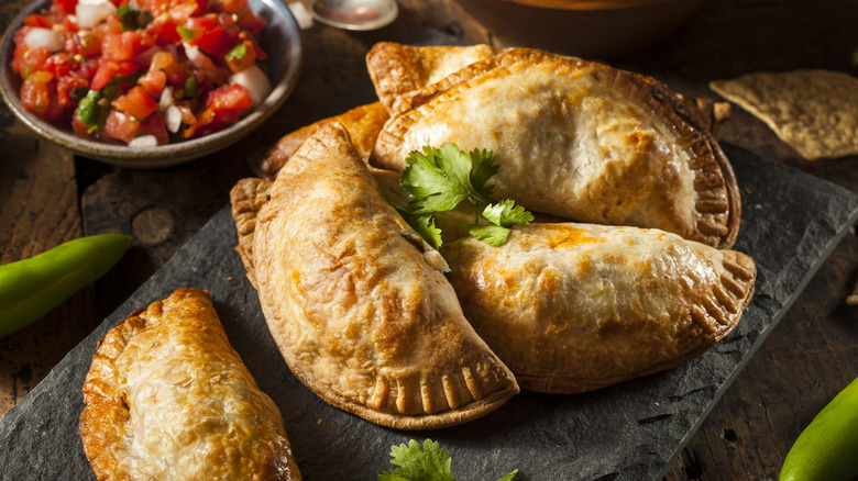 Empanadas on a slate board