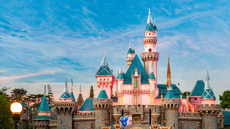 A castle at Disneyland against a blue sky