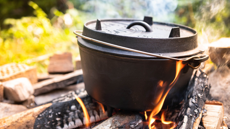 Dutch oven over campfire