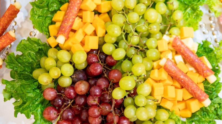 cheese, grapes, and salami board