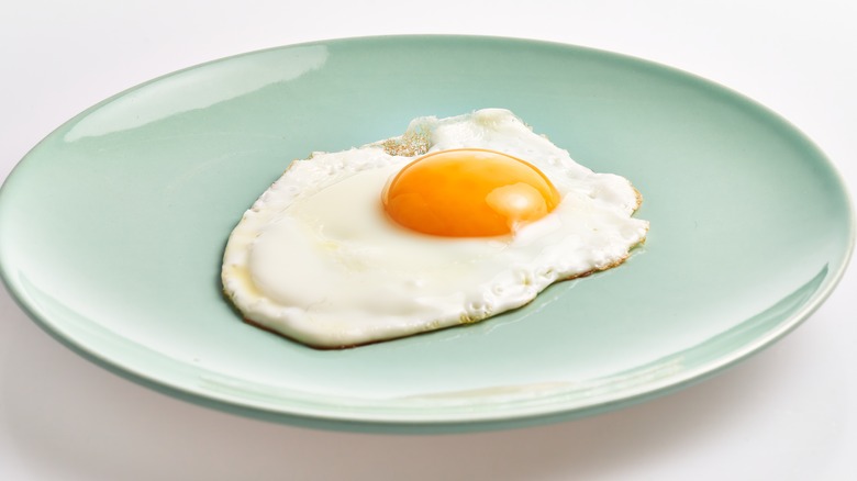 plated sunny-side-up egg