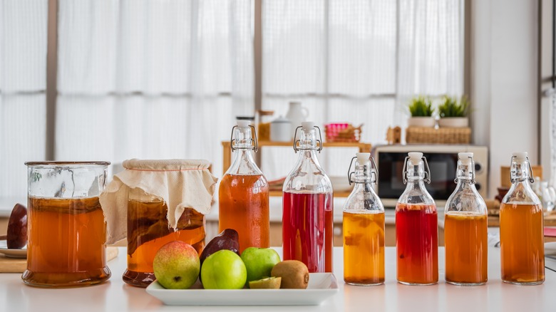 Jars of kombucha in different colors