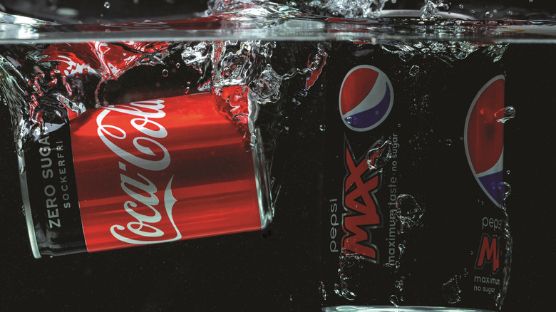 Coke Zero and Pepsi Max under water