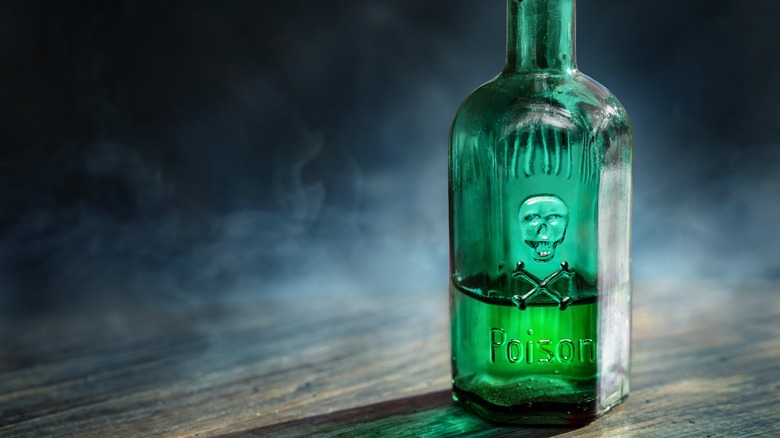 Green liquid in glass bottle