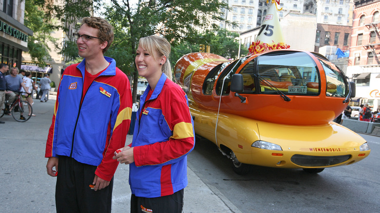 Hotdoggers in front of the Wienermobile