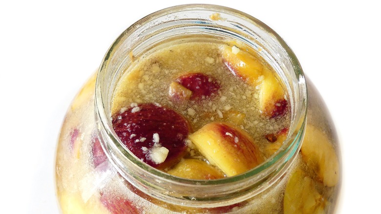 apple pieces in glass jar