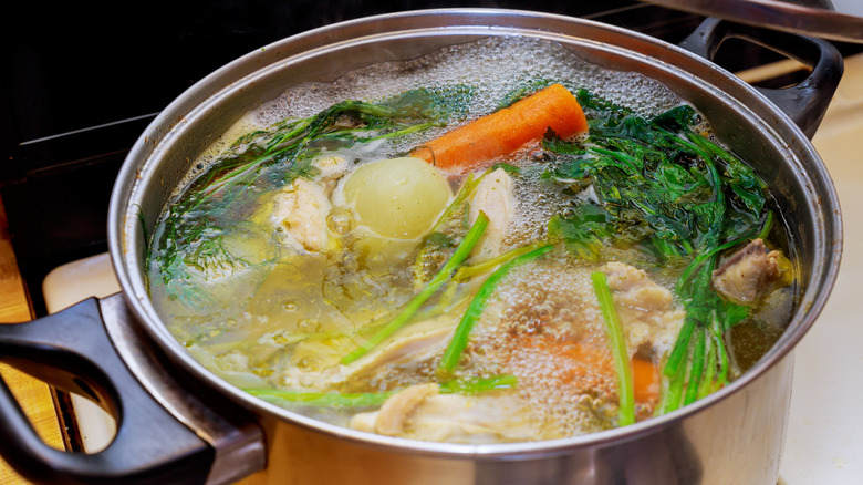Boiling broth of assorted vegetables