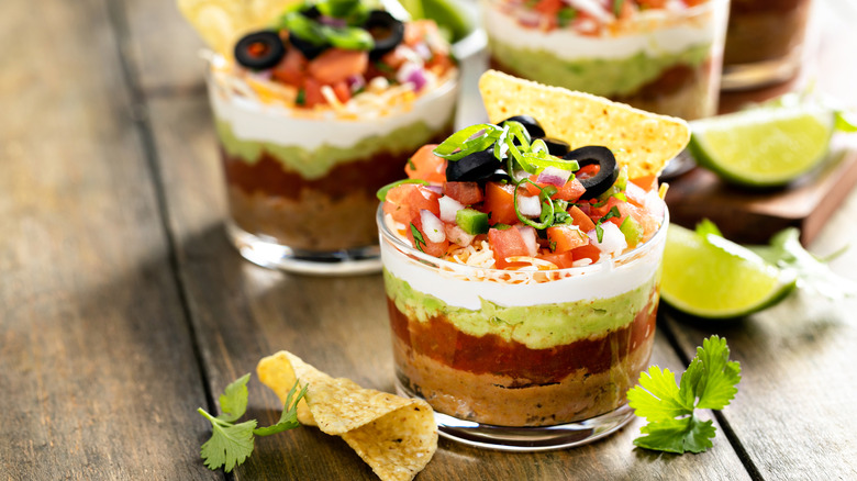 mexican bean dip in bowls