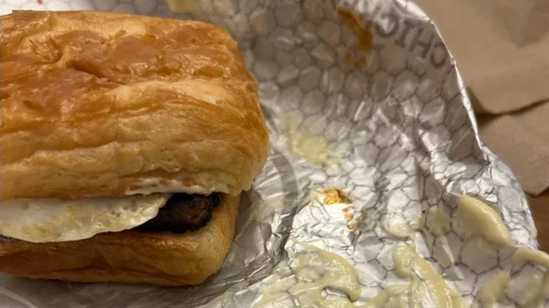 croissant sandwich on foil wrapper