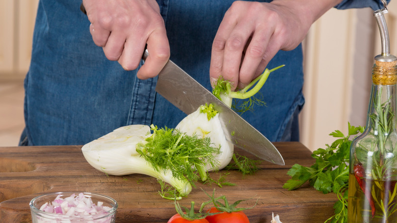 Fennel being chopped on cutting board