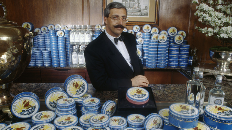 Armen Petrossian behind the counter of his caviar boutique in Paris