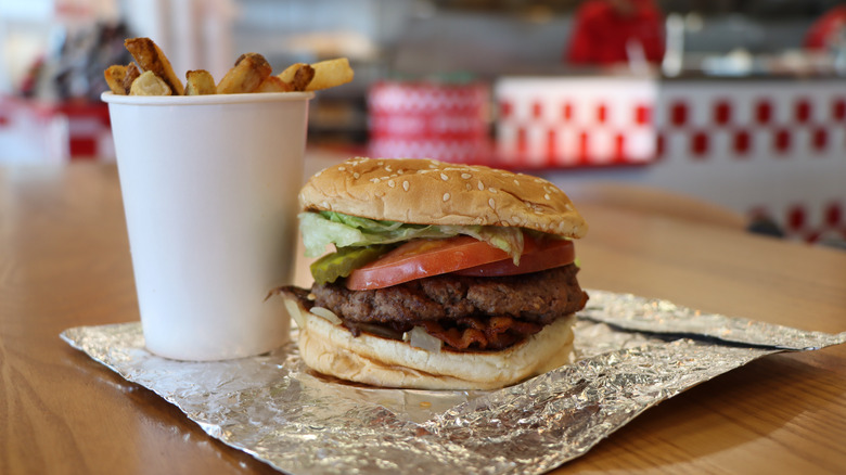 Five Guys burger and fries on a table