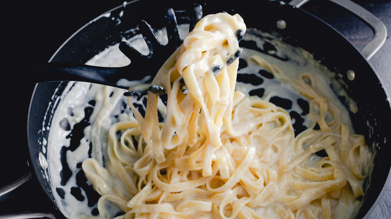 Alfredo sauce in pan