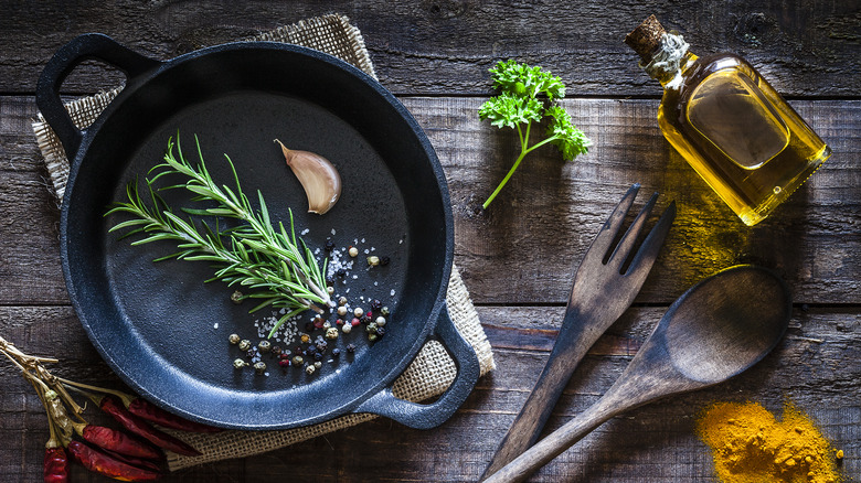 fresh rosemary sprigs in a cast iron pan