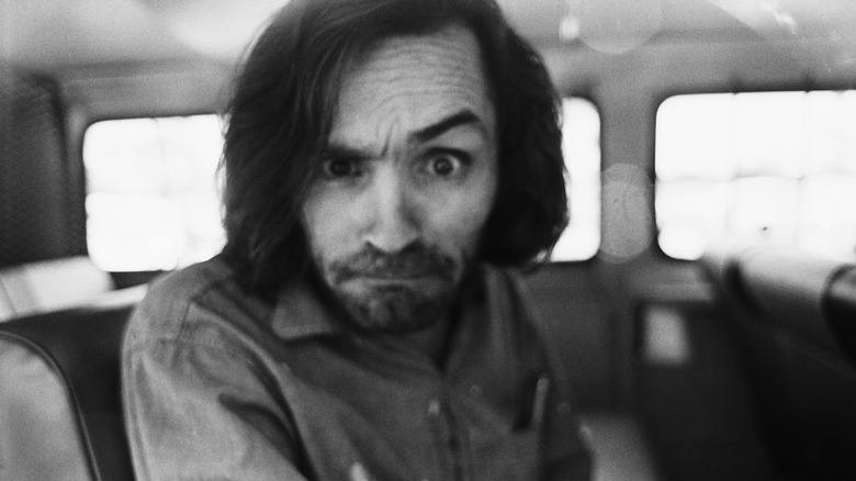 Charles Manson raising eyebrow