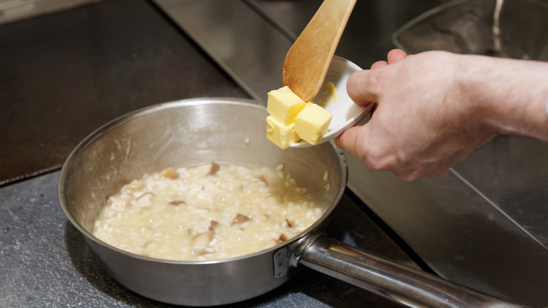 butter into pan of risotto