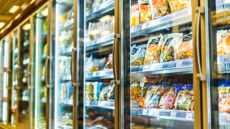 bags of frozen food in a grocery store