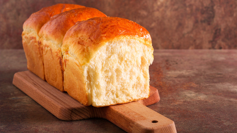 bread loaf on cutting board