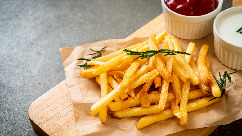 french fries on cutting board