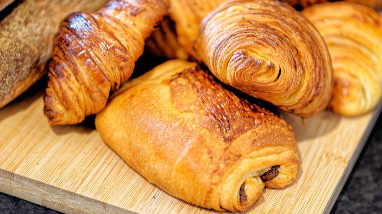 various croissants on cutting board