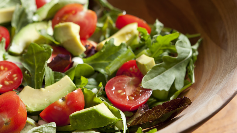 avocado salad with mixed greens and cherry tomatoes