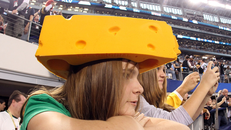 Packers fan with cheese hat