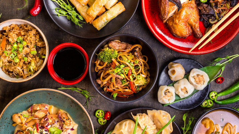 Chinese food dishes on table