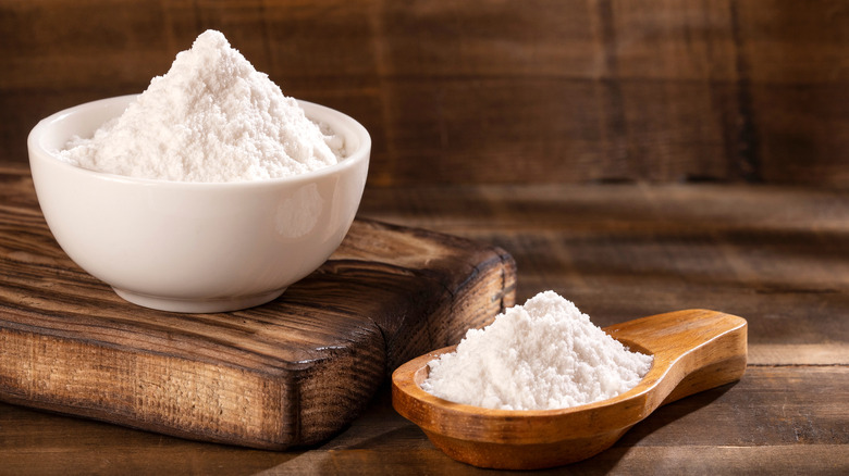 baking soda in a bowl and spoon