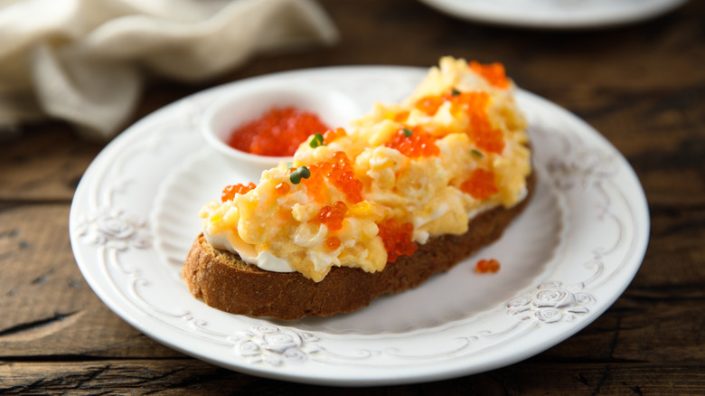 Salmon roe on scrambled eggs on toast