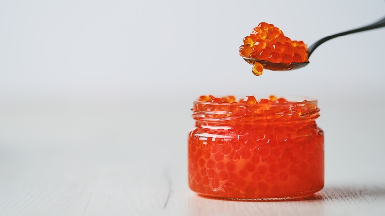 Salmon roe in small glass jar