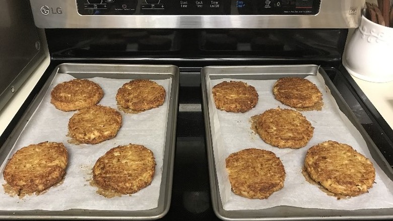 Crab cakes on baking sheets