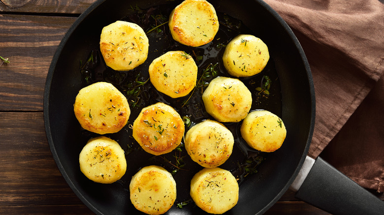 fondant potatoes in skillet