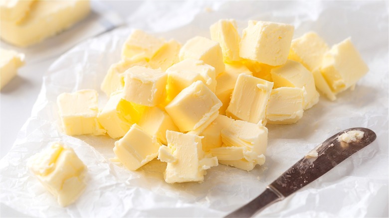 Cubed butter on wax paper