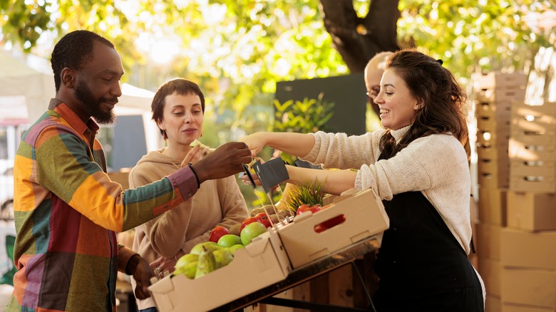 people shopping at farmer's market