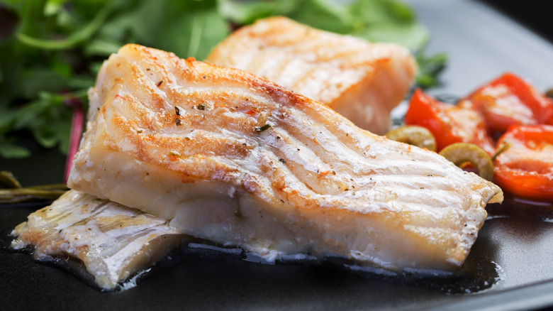 cooked fish filets on plate