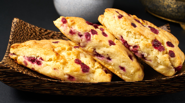 scones on a black table