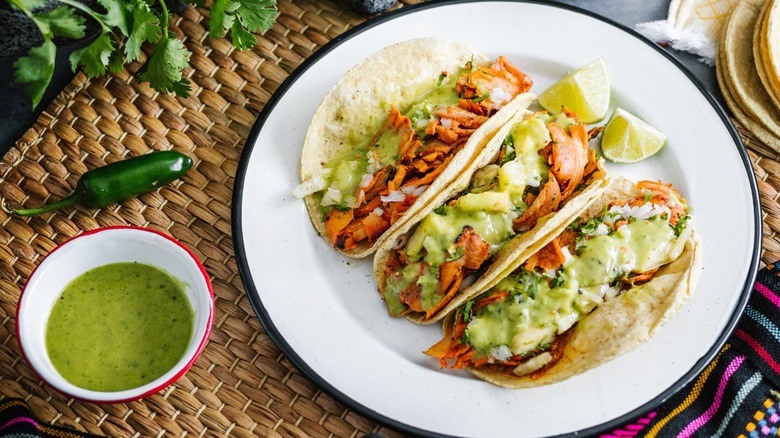 Plated chicken tacos with pineapple