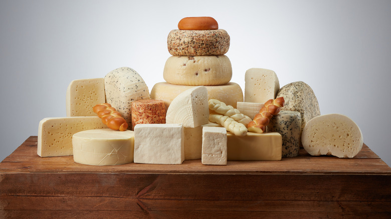 Various cheeses on a table