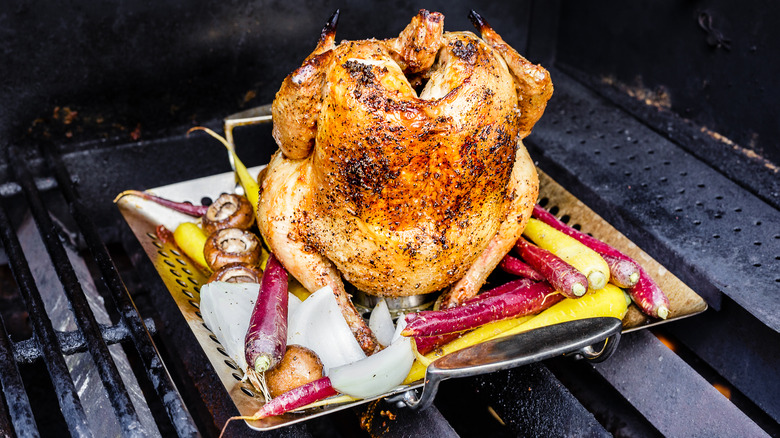 Beer can chicken on grill