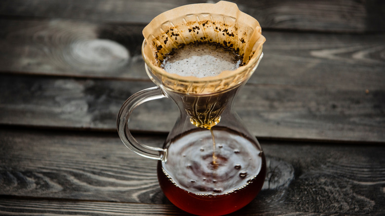 Filtering coffee into a pitcher