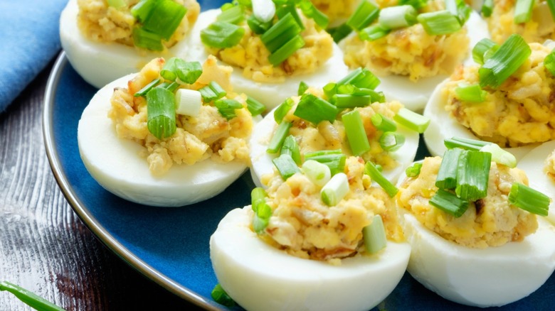 Deviled eggs topped with green onions