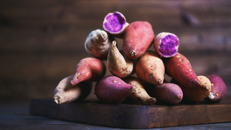 stack of various sweet potatoes 