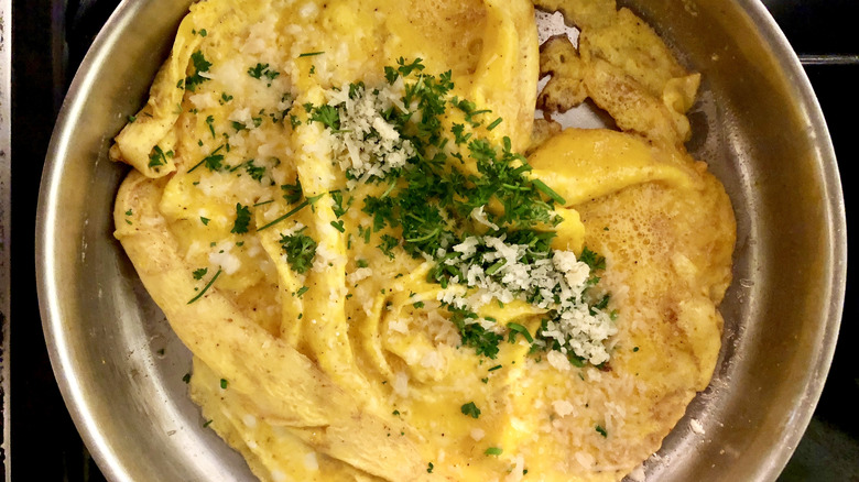 French omelet gently cooking