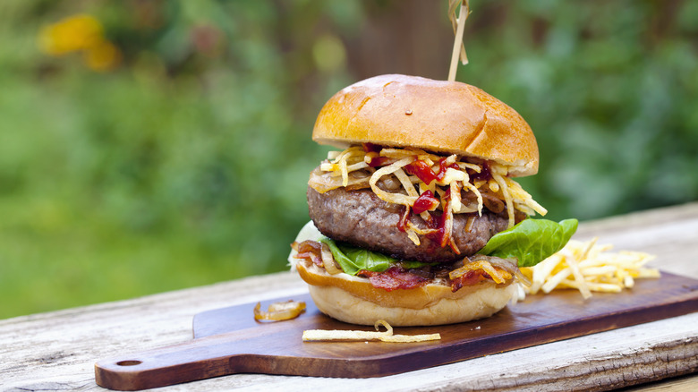 burger with fried onion strings