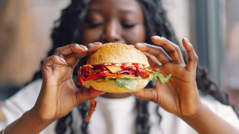 woman eating a burger