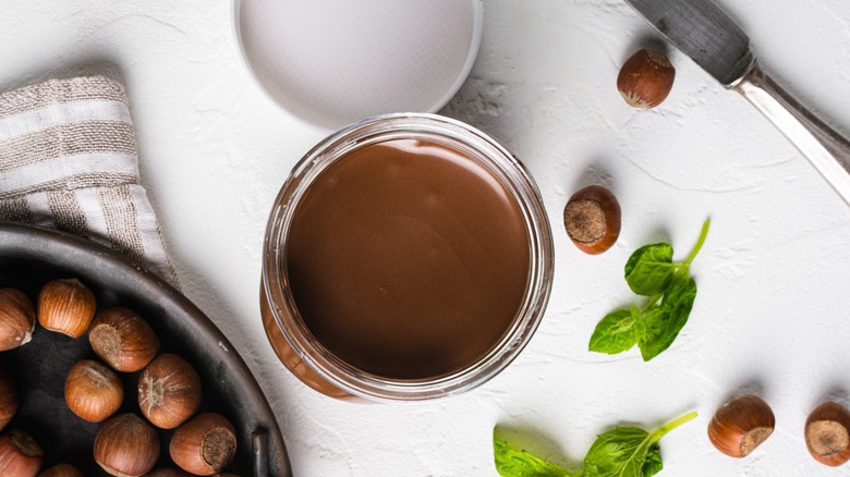 overhead open jar of Nutella on countertop