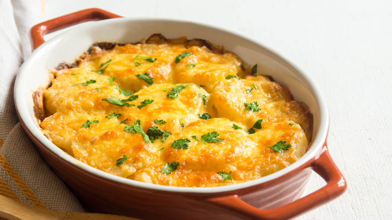 Potatoes dauphinoise in casserole dish