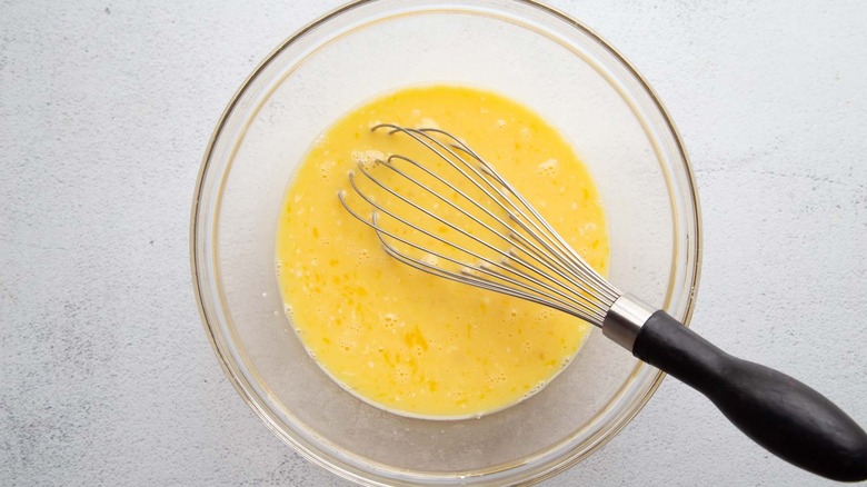 egg mixture with a whisk